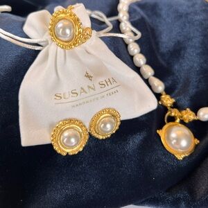 Susan Shaw handcrafted custom necklace, clip-on earrings, and ring.